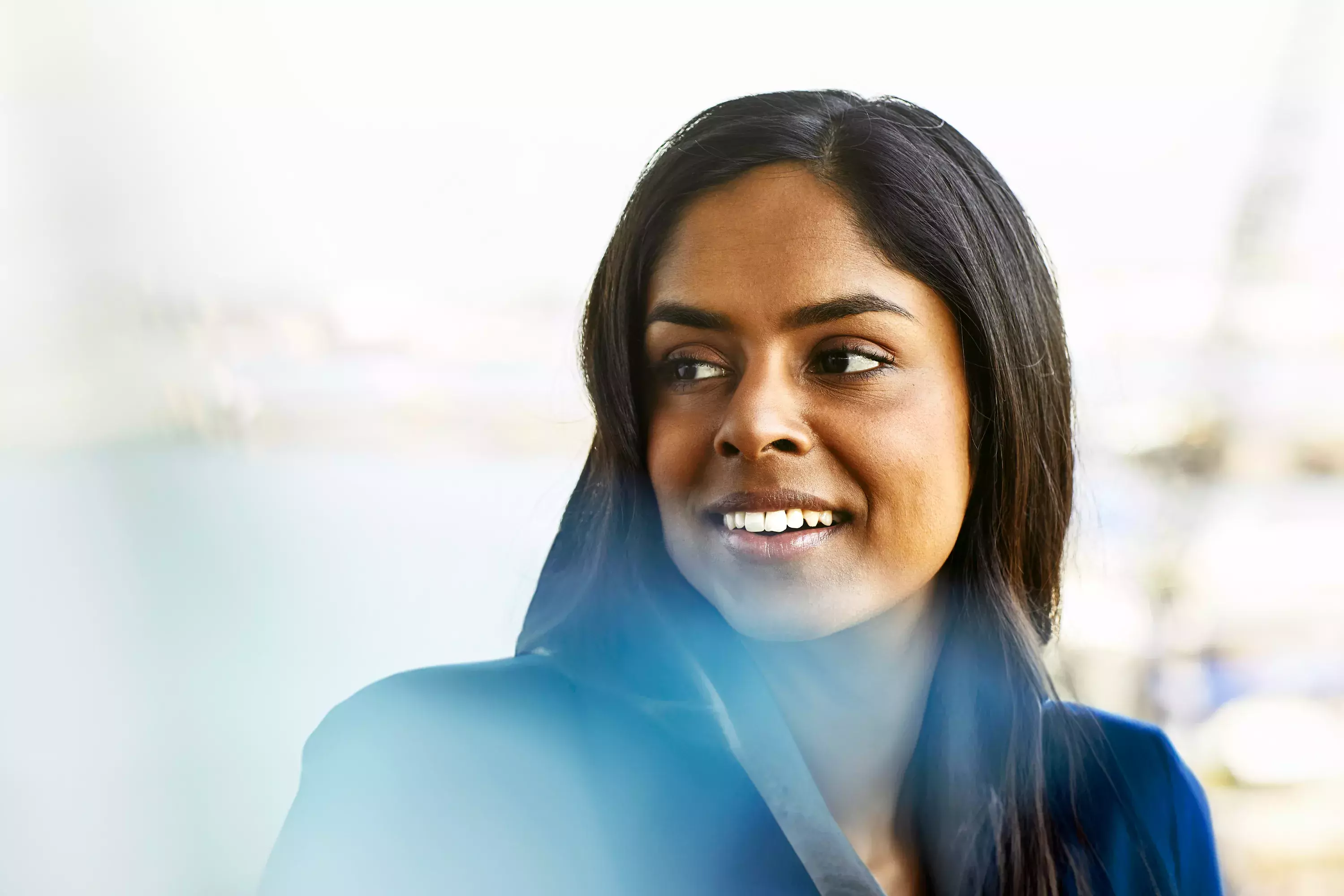 Close up - Smiling female looking away 
